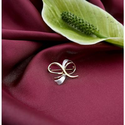 Image 1 of Two-tone gold brooch as a bow