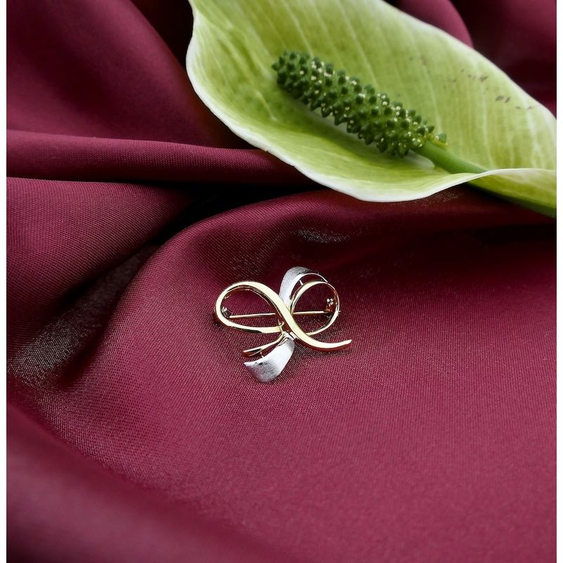 Image 1 of Two-tone gold brooch as a bow