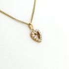 Image 8 of Gold pendant in the shape of a heart with diamonds; 0.49 ct.