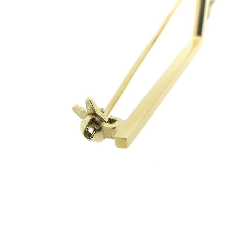 Image 8 of Two-tone gold long narrow brooch with diamonds; 0.15 ct.