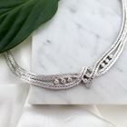 Image 4 of White gold herringbone link necklace with diamond; 0.63 ct.