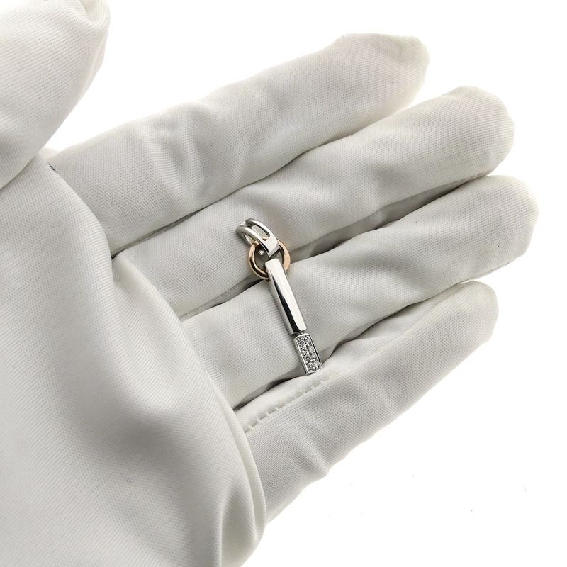 Image 3 of Two-tone gold pendant with diamond; 0.05 ct.