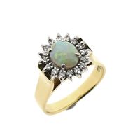 Gold ring with opal and entourage of diamonds; 0.16 ct.