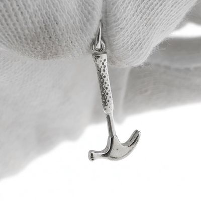 Silver charm; Claw hammer Image 1 of Silver charm; Claw hammer