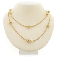 Long gold link chain with beads