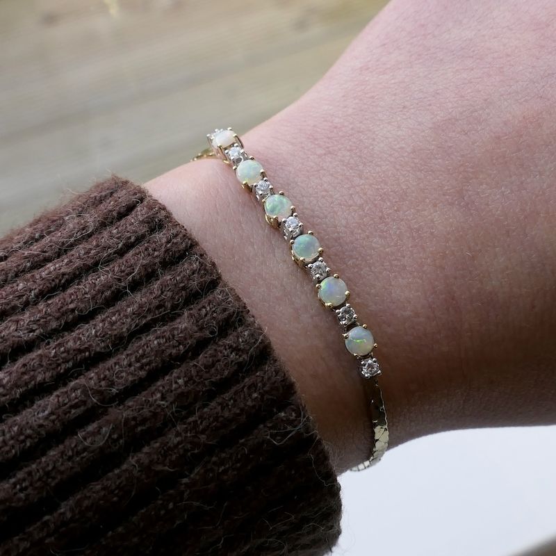 Image 8 of Gold cobra link bracelet with opal and diamond; 0.24 ct. | 17 cm