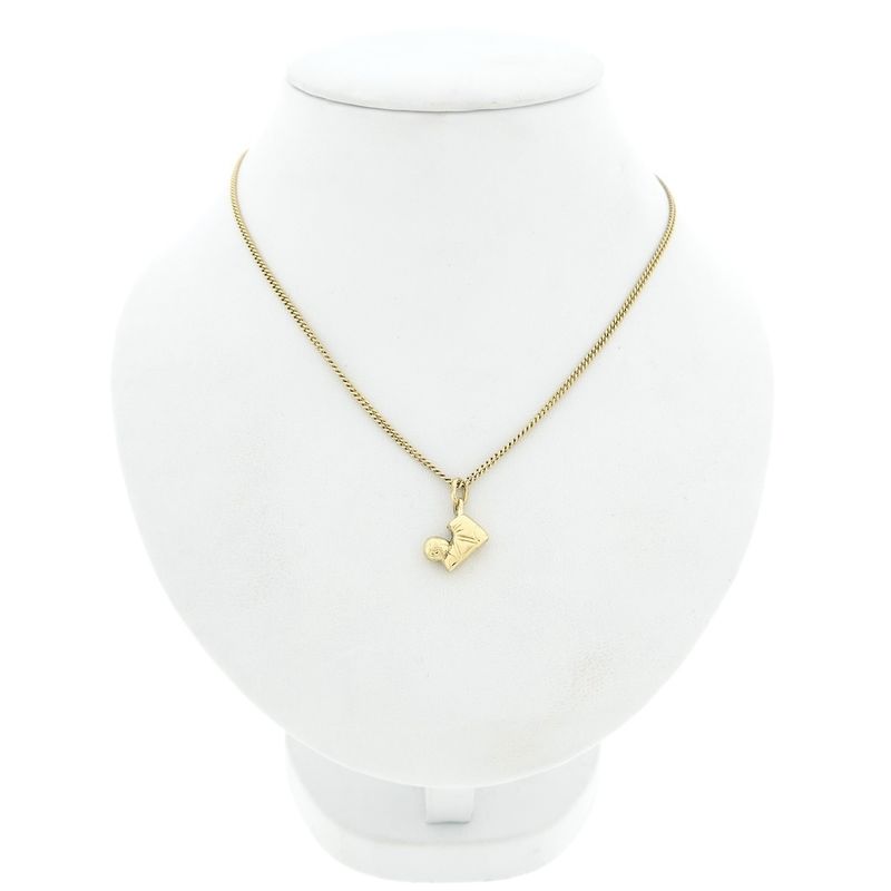 Image 7 of Gold pendant of a football with a shoe