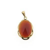Gold pendant with carnelian