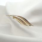 Image 2 of Gold brooch with two feathers