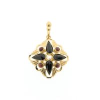 Vintage gold pendant with garnet