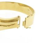 Image 9 of Robust gold slave bracelet.