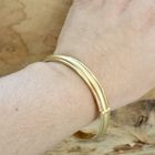 Image 2 of Solid gold slave bracelet.