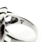 Image 6 of Silver ring with a wavy design.