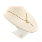 Image 8 of Gold pendant of a heart with a key