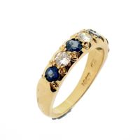 18-karat gold ring with diamond and sapphire | approx. 0.51 ct.