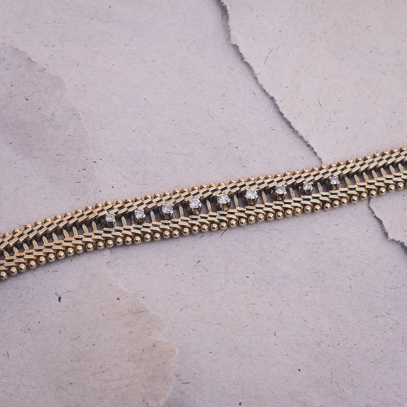 Image 7 of Gold herringbone link bracelet with diamonds; 0.21 ct.