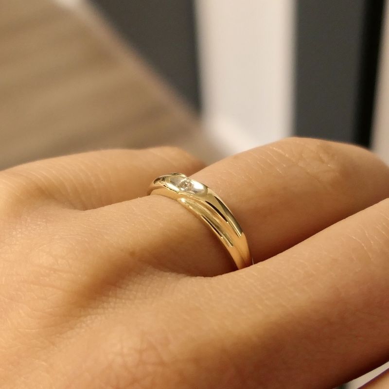 Image 10 of Gold solitaire ring with diamond; 0.04 ct.