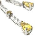 Image 5 of White gold stud earrings with yellow sapphire and diamond; 0.56 ct.