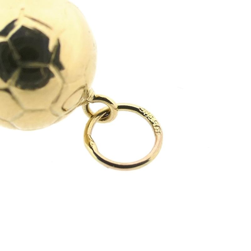 Image 8 of Gold pendant of a football