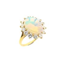 Gold ring with opal and diamond; 1.26 ct.