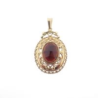 Gold vintage pendant with garnet stone | filigree