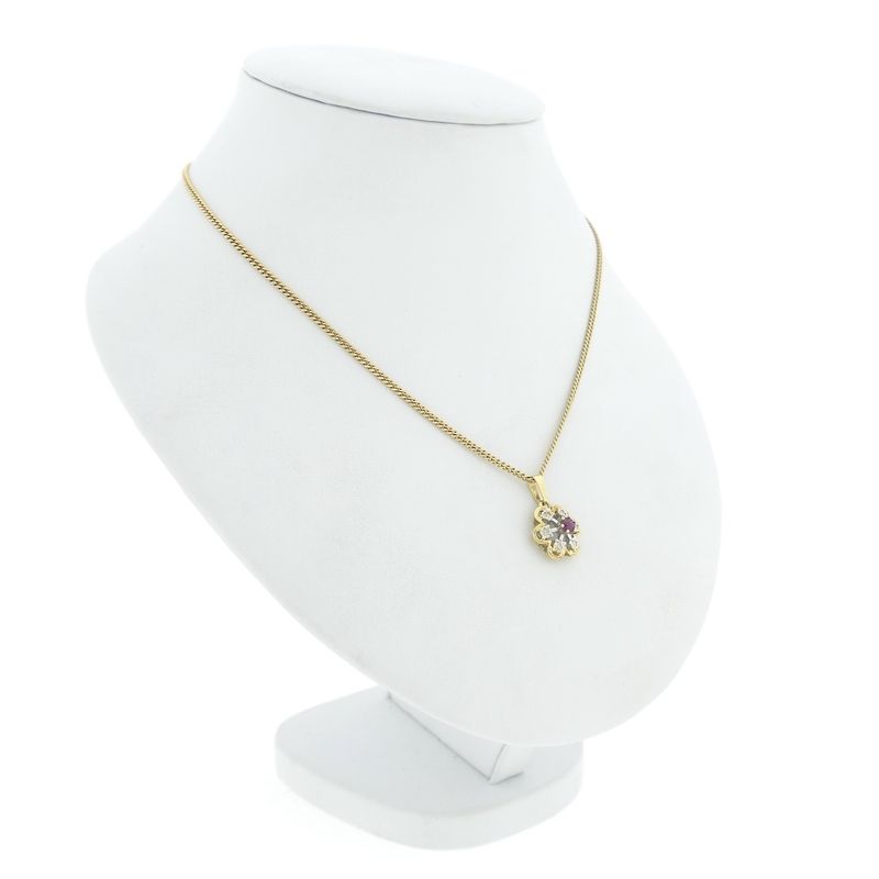 Image 4 of Two-tone gold flower pendant with ruby ​​and diamond | 0.06 ct.
