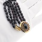 Image 9 of Antique garnet bead necklace with gold decorative clasp.