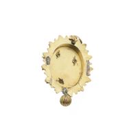 Gold pendant of an antique hat bell