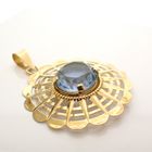 Image 2 of Gold pendant with light blue glass crystal