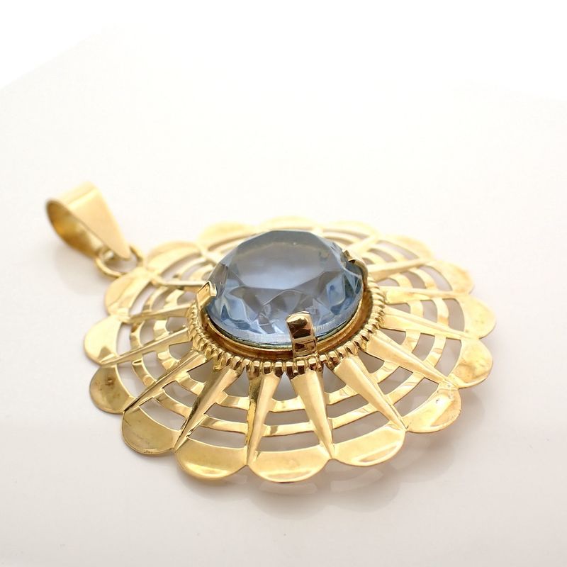 Image 2 of Gold pendant with light blue glass crystal