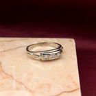 Image 2 of White gold ring with 0.06 ct diamond.