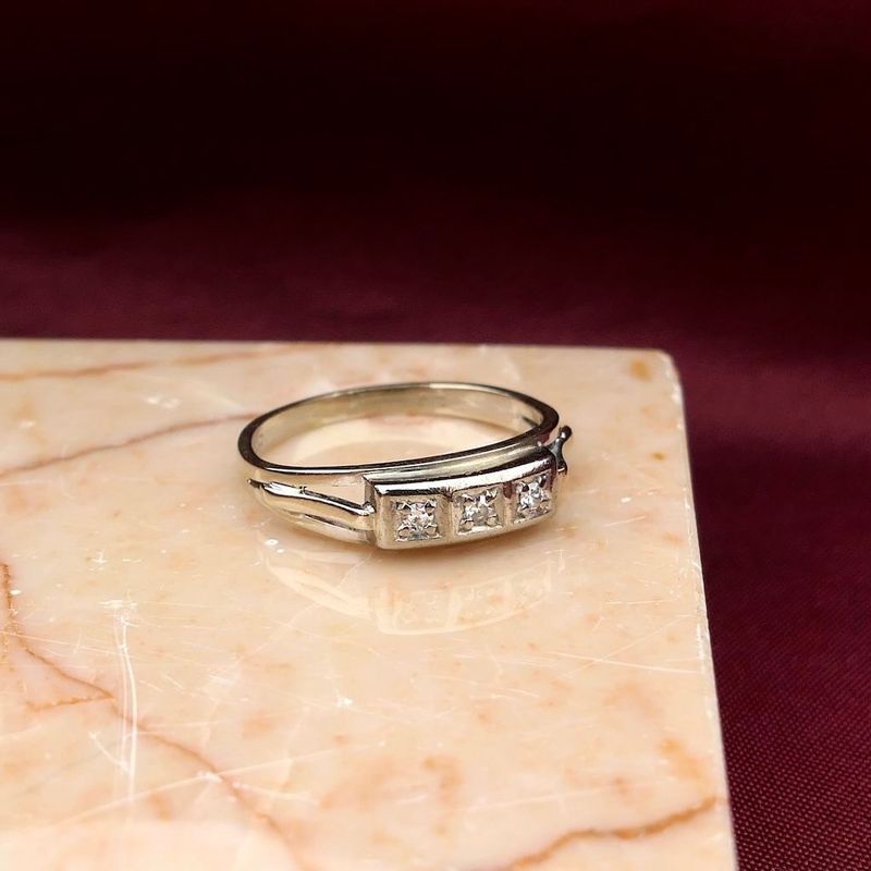 Image 2 of White gold ring with 0.06 ct diamond.