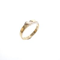 Two-tone gold fantasy ring set with 0.06 ct diamond.