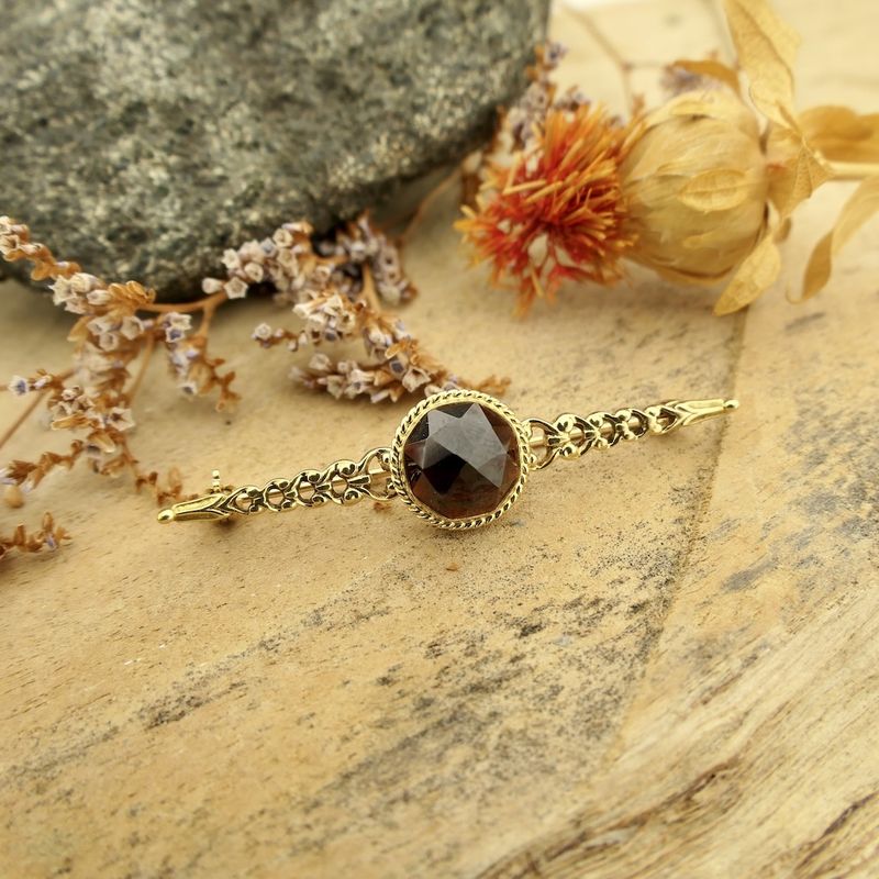 Image 2 of Antique gold brooch with garnet.
