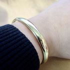 Image 2 of Gold smooth slave bracelet; Size M/L