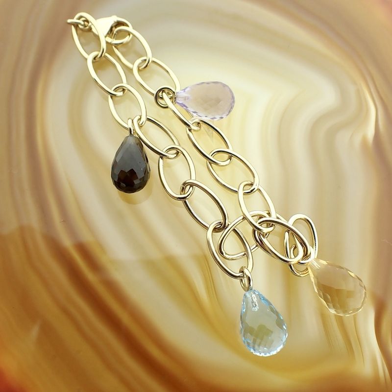 Image 2 of Gold link bracelet with topaz and smoky quartz.