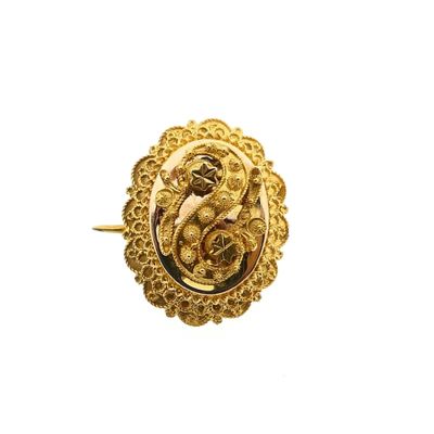 Afbeelding 1 van Antiek gouden broche van een mutsenbel 