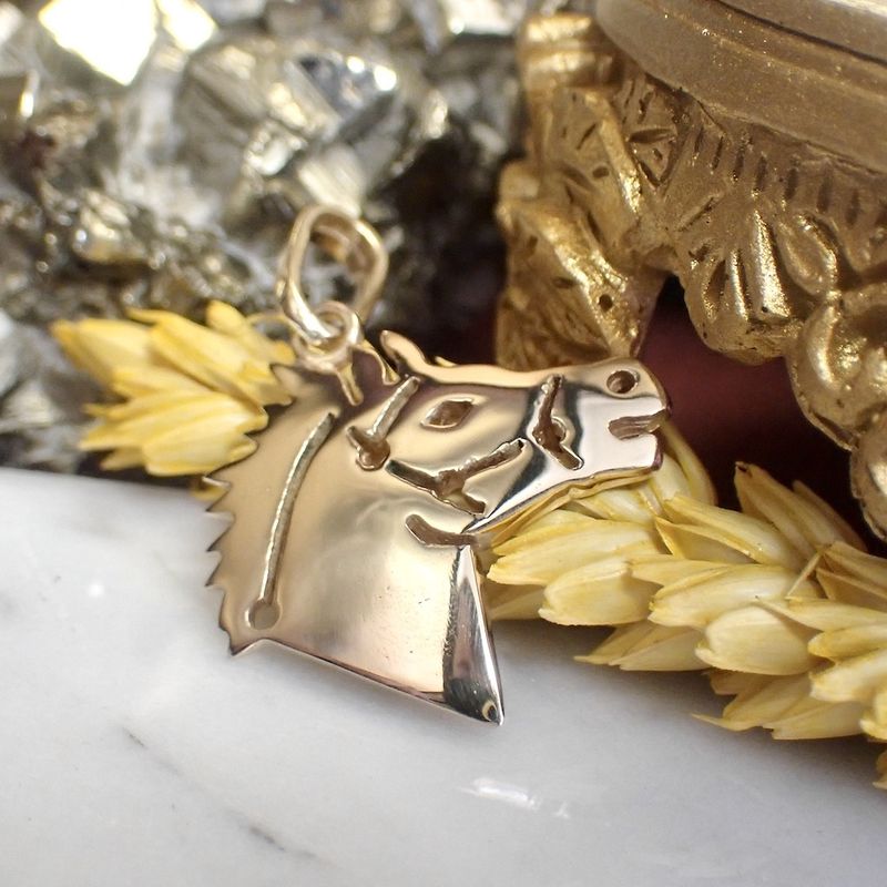 Image 8 of Gold pendant of a horse's head
