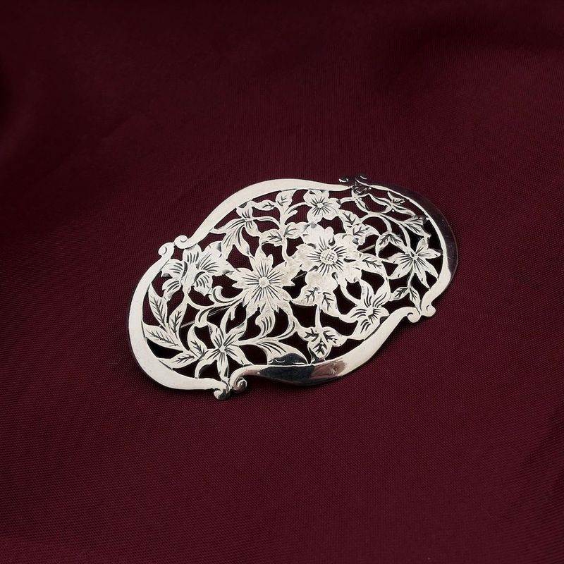 Image 2 of Silver brooch with floral motif