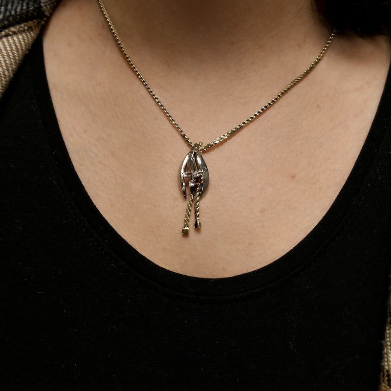 Image 11 of Two-tone gold necklace with fixed pendant and diamonds; 0.09 ct.