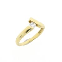 Golden fantasy ring with zirconia.