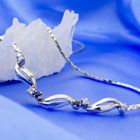 Image 2 of White gold necklace with fixed pendant of sapphires and diamonds; 0.14 ct.