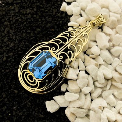 Image 2 of Gold pendant with light blue tourmaline.