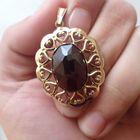 Image 2 of Vintage gold pendant with garnet stone.