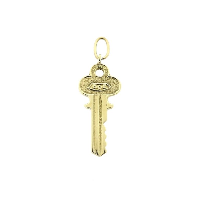 Image 1 of 18 carat gold pendant of a key