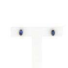 Image 1 of 18 carat gold stud earrings set with tourmaline