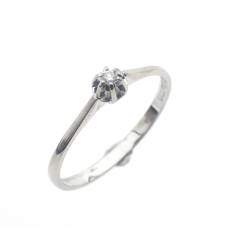 Image 1 of White gold solitaire ring with 0.03 ct diamond.