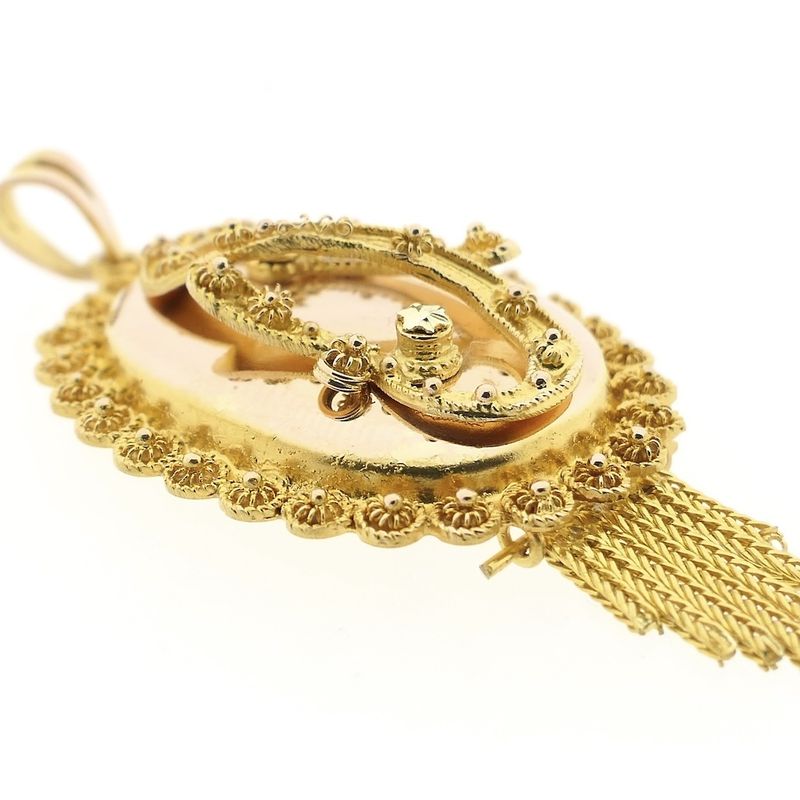 Image 10 of gold pendant of a hat bell