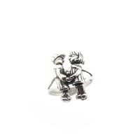Silver ring with movable figures