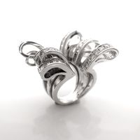 18-karat exclusive white gold cocktail ring with 4.40 ct. diamonds.